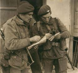 Maj Barnes &amp; Lt Watson consult maps before attack Athens. 23 December 1944.JPG