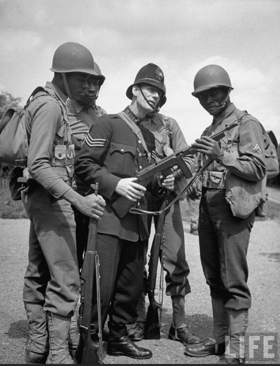 British Bobby and US troops with TSMG.jpg
